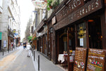 Load image into Gallery viewer, The exterior of a restaurant in the Latin Quarter in Paris.
