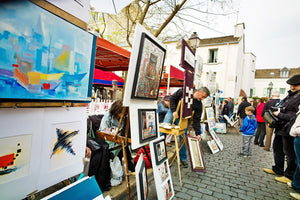 Artists displaying their wares near Sacre Coeur church in Paris. 