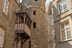 Load image into Gallery viewer, The ancient balcony on the  oldest house in the city of Dinan.
