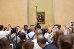 Load image into Gallery viewer, Tourists taking selfies in front of the Mona Lisa.
