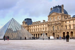 Load image into Gallery viewer, The plaza in front of the Louvre museum in Paris, France.
