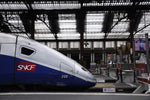 Load image into Gallery viewer, The engine of a TGV train before heading to the city of Nice, France.
