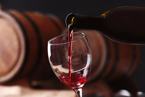 A sommelier pours a Burgundy wine taste in Burgundy, France.