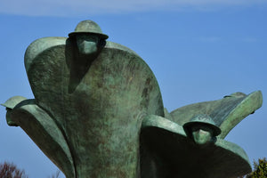 A statue of two Canadian soldiers at the Juno Beach Centre.