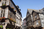 Load image into Gallery viewer, Half-timbered houses in the medieval city of Dinan, France.
