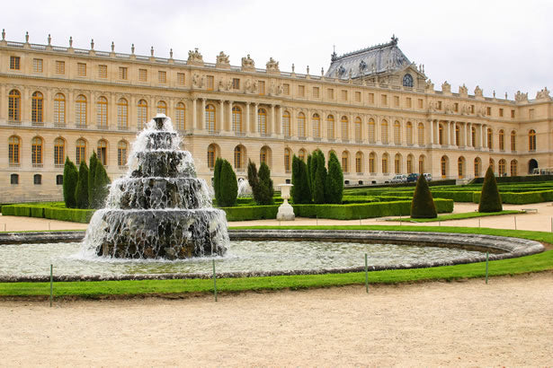 The exterior view of the Versailles from the gardens.